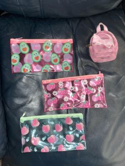 3 cosmetic bags and coin backpack