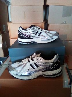 Brand New men's new balance 1906R silver metallic shoes sizes 8.5&10 available