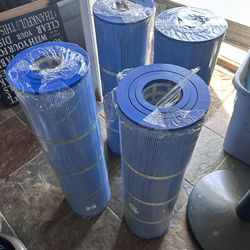 Pool filters 4 total sold together approximately 25 inches long and 7 inches wide