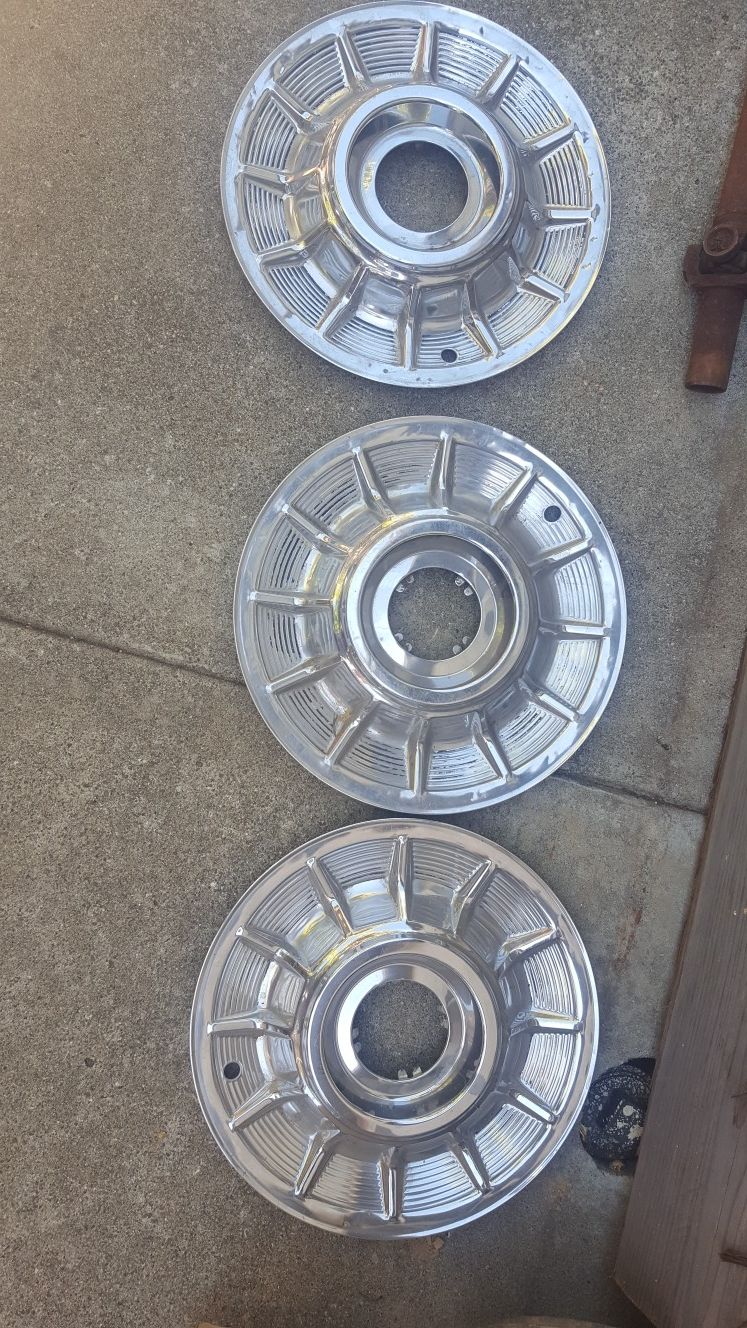 1957 Cadillac hubcaps (sombreros) for Sale in Mount MADONNA, CA OfferUp
