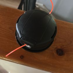 Bump A Feed String Trimmer Head
