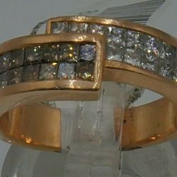 14kt rose gold " cocktail " ring with white and champagne diamonds .size 7.25 . Total weight 7.7 gr 13 white princess cut and 12 champagne diamonds ap