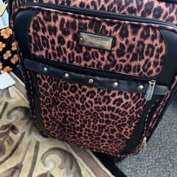 Jessica Simpson carry-on 