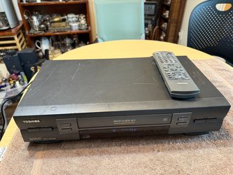Functional Toshiba W603 Hi-Fi Stereo 4-Head VCR. This black unit has a pro drum system and includes the original Toshiba remote control. It is an Ener