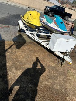 Sea Doos. 1996 Yellow 1997 Green