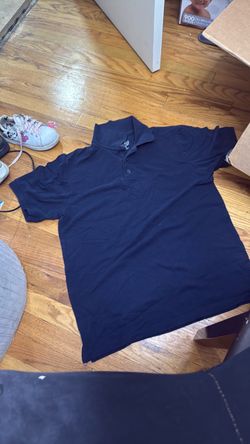 Tbh idk what brand but navy blue polo