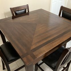 dark wood dining table w/ 4 chairs