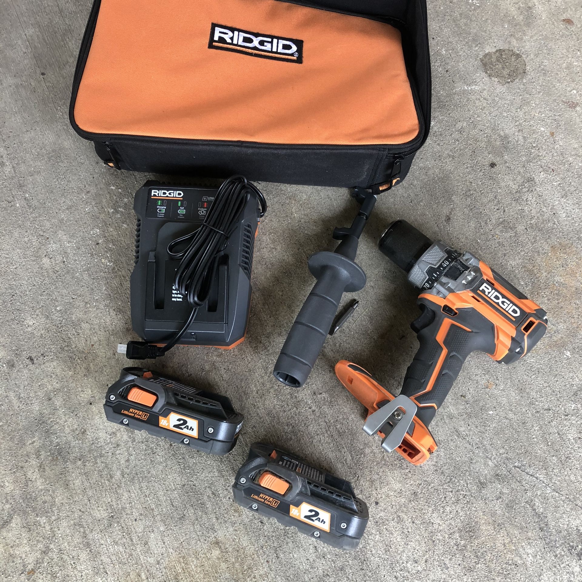 RIDGID 18-Volt Lithium-Ion Cordless Brushless 1/2 in. Compact Hammer Drill Kit with (2) 2.0 Ah Batteries, Charger, and Bag