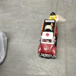 M&M Fireman On A Fire Truck Toy Truck