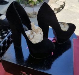 Black 4” heel size 7