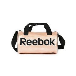 New. Open Box. Never Worn. Brand New. Reebok Mini Bag Perfect For On The Go Fits Perfect For Phone, Planner, Keys, Wallet, & Makeups, Etc. 