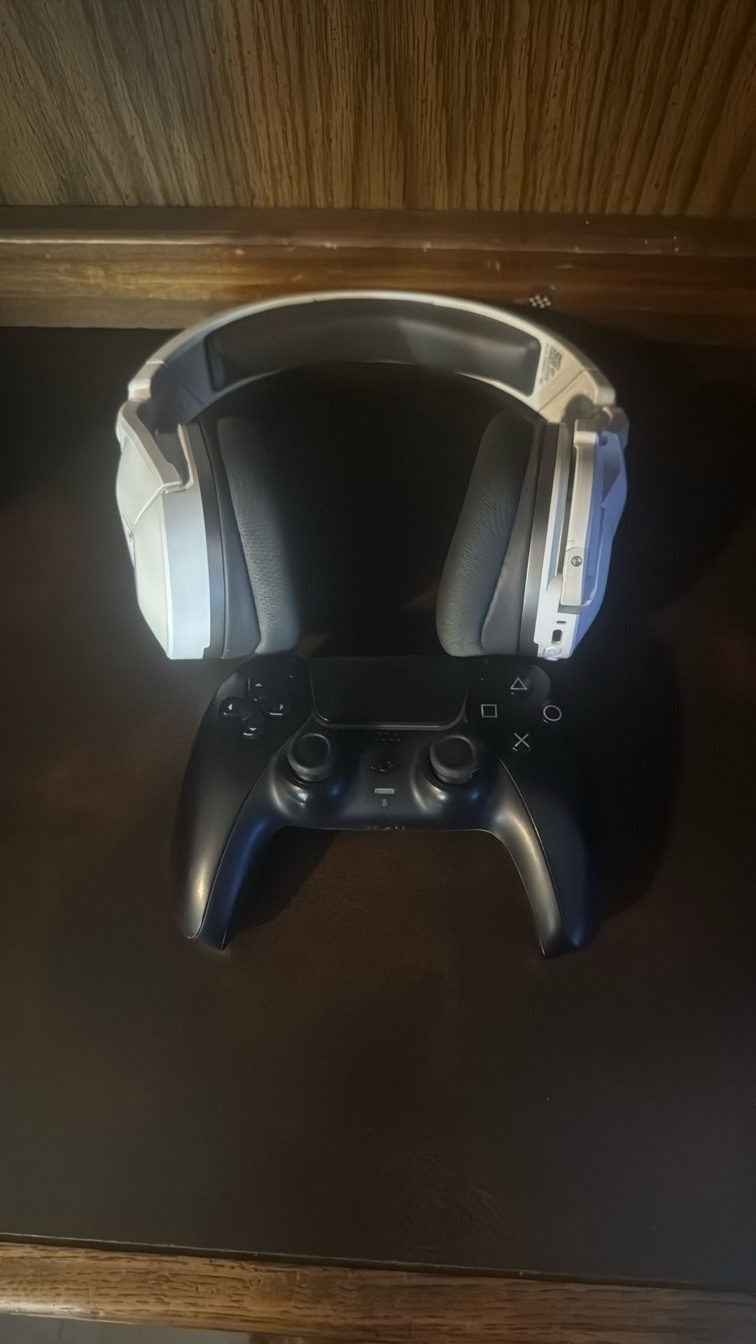 Black PS5 Controller And White Turtle Beach Headset