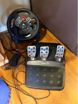 PlayStation three steering wheel and gas and brake pedals