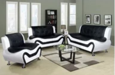 Fairly new Black And white Leather couches