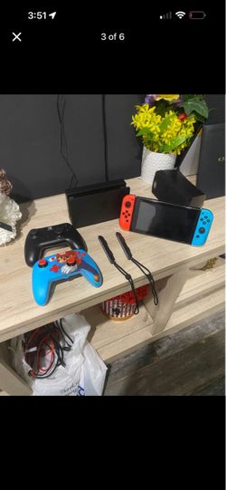 Nintendo Switch with Neon Red and Blue Joy-Cons