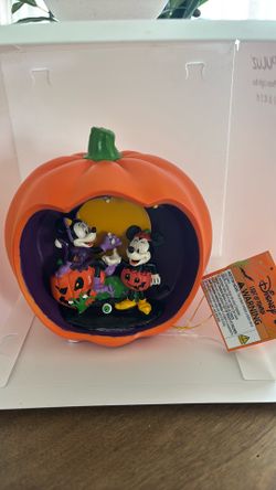 Halloween pumpkin with Mickey and Minnie Mouse