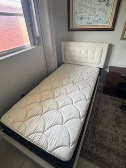 Twin upholstered bed and mattress LIKE NEW!