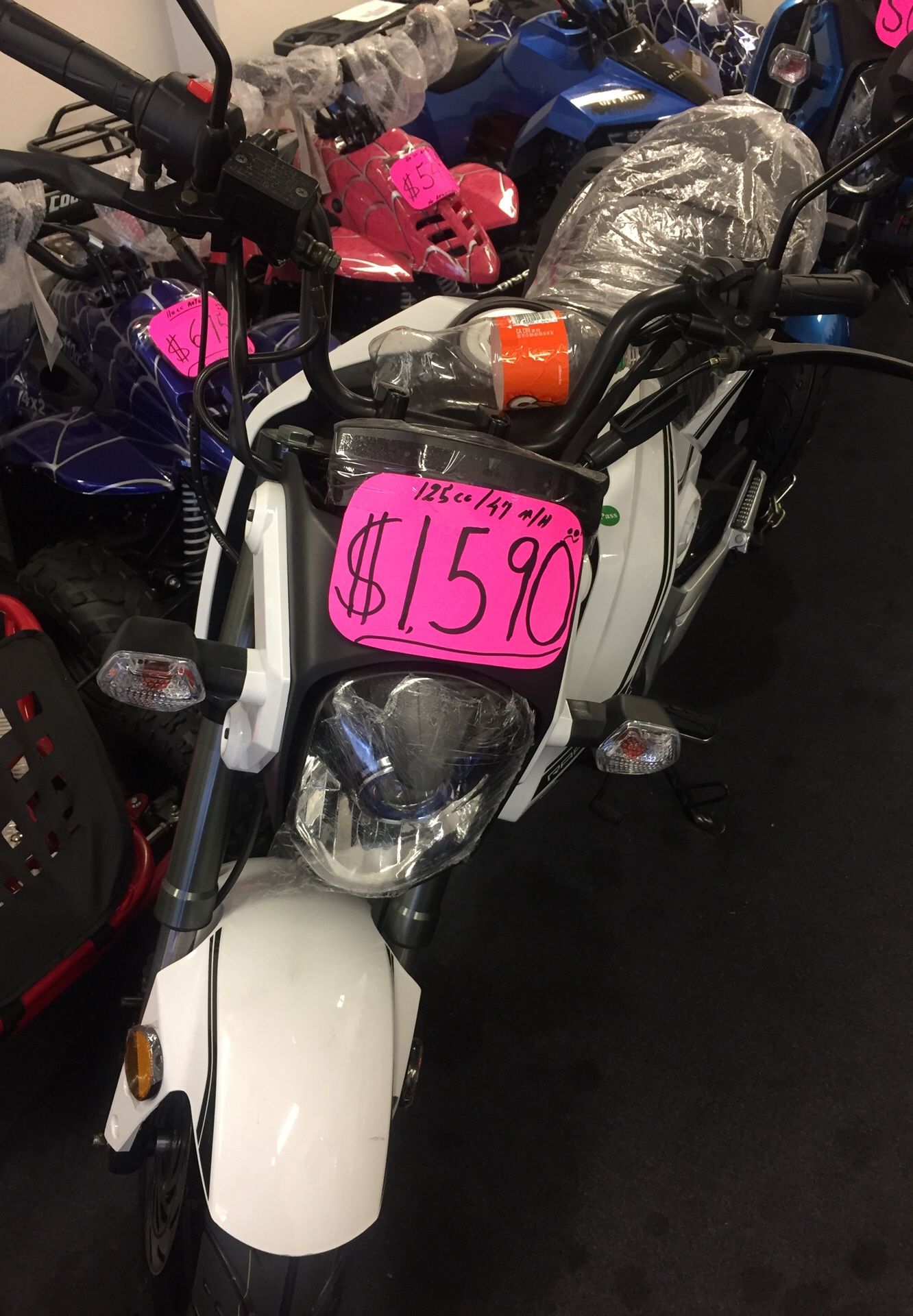 Brand new Hellcat Motorcycle by Tao Tao 125cc engine, price includes all, out the door. Street legal 47 mikes per hour.