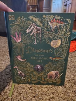 Dinosaurs and other prehistoric life book- new