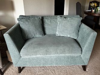 Light teal loveseat