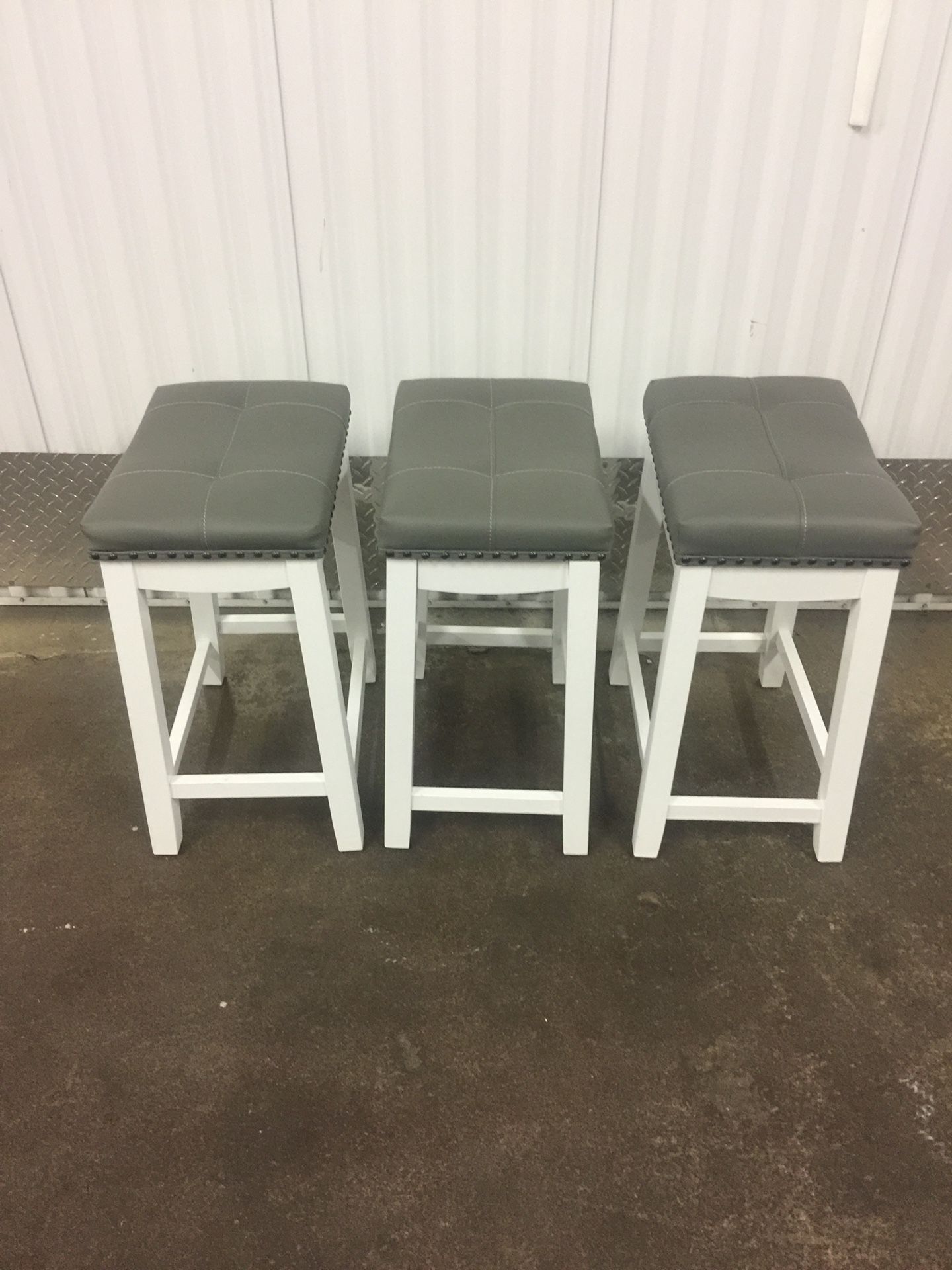 3 24” bar stools new .