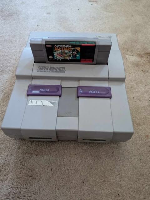 Super Nintendo with game