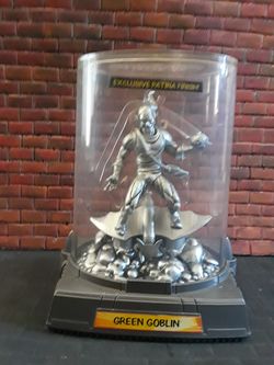 The green goblin statue (not an action figure)