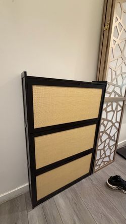 Thin black and woven shoe organizer