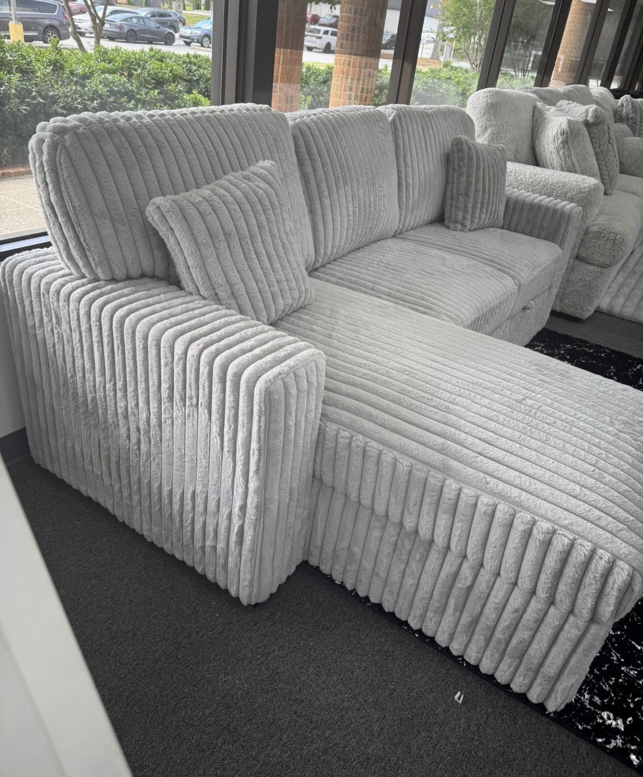 Reversible sectional w/Pull out bed lowest Priced Guaranteed.
