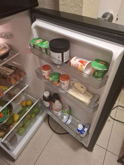 Selling both items together for $120 OBO.
Includes a Premium Levella black refrigerator with separate freezer compartment and a large black metal clot