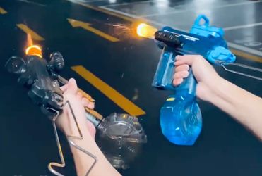 Set of 2 brand new electric squirt water toys