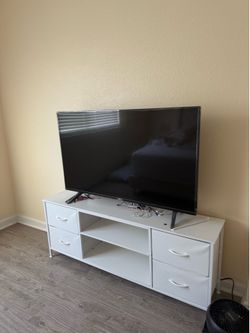 LG 50” Smart TV + White TV Stand