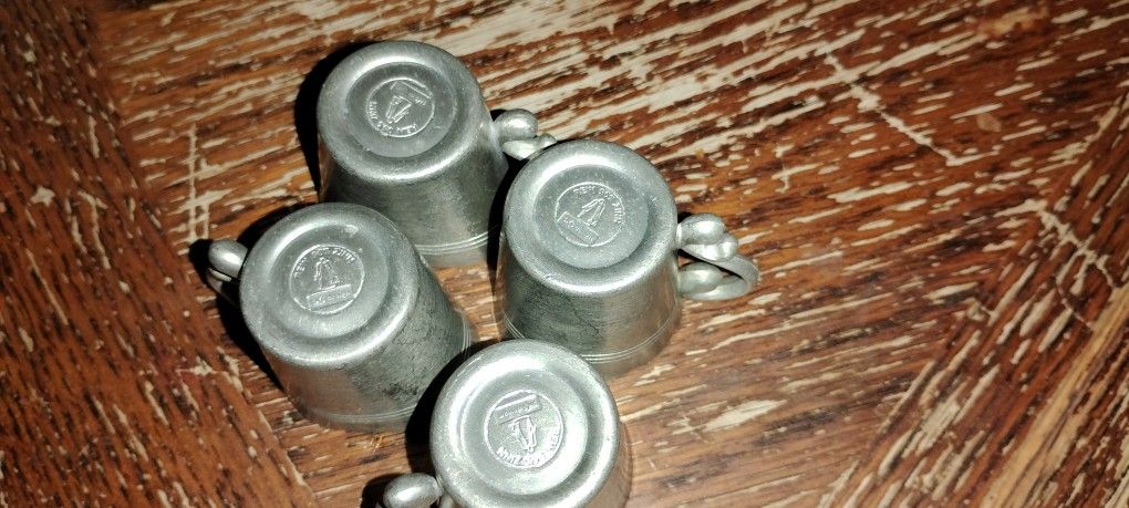 vintage pewter shot glasses, likely made in Germany