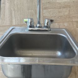 Still Sink , With water Faucets.  