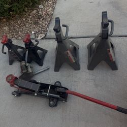 Two Sets Of Jack Stands And Two Hydraulic Jacks. 