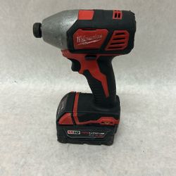 Milwaukee quarter inch hex impact driver with XC 5.0 battery new charger