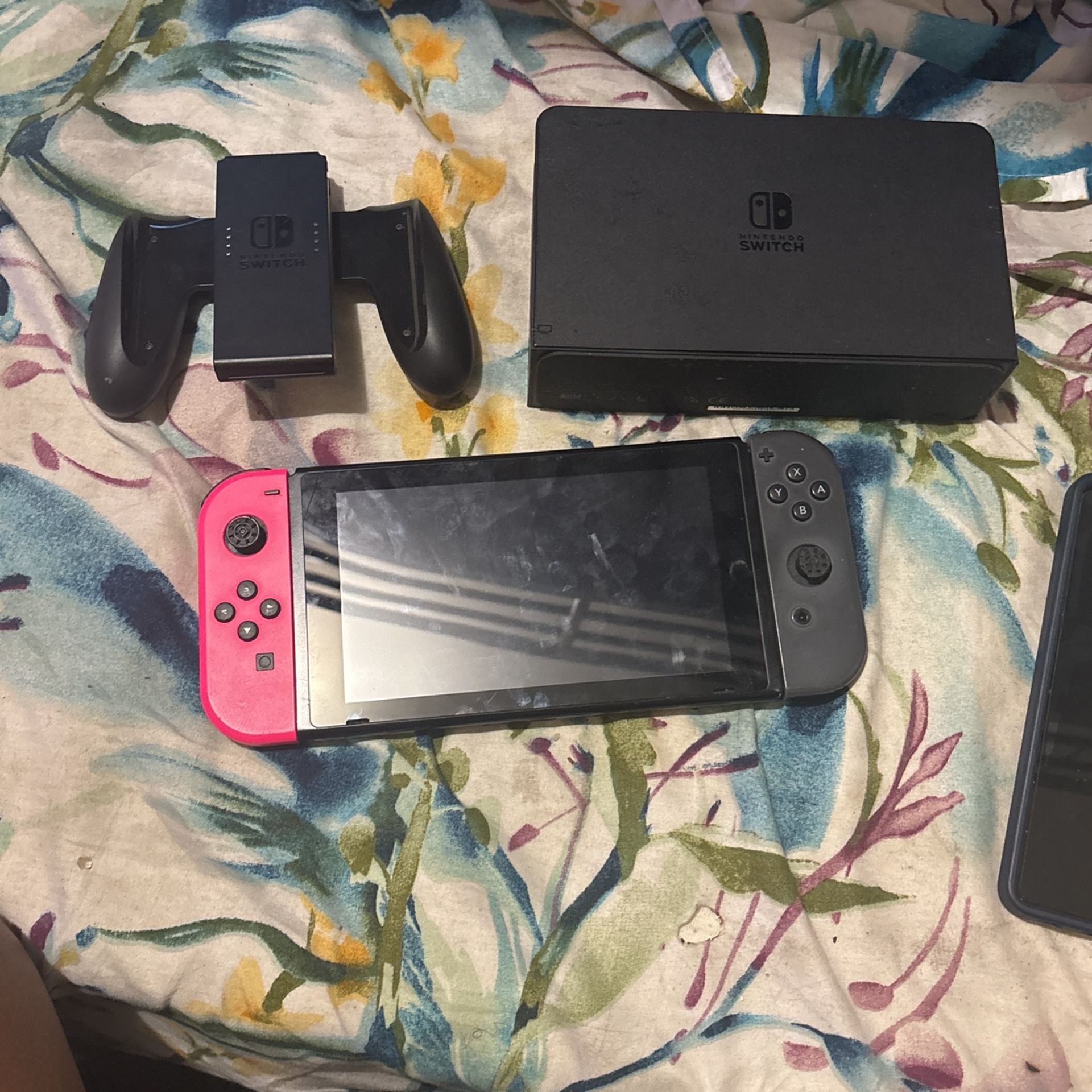 nintendo switch with doc and controller