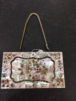 Vintage mother-of-pearl compact.