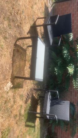 Outside table and chairs with glass