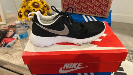 Nike Black Sneakers with Silver Swoosh