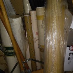 Wall Paper Rolls And Big Roll Of Canvas. 