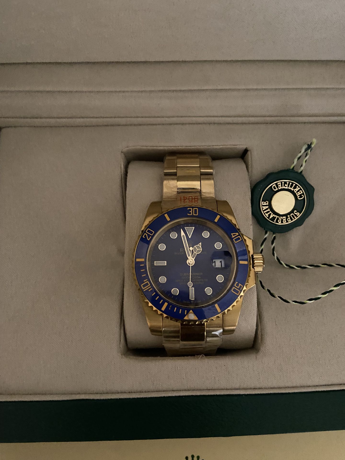 Rolex Submariner 116613LB Gold Oyster Bracelet with Blue Bezel