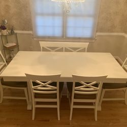 Crisp White 6 Person Dining Table And Chairs