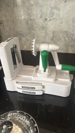 Zucchini spiral, steamer, wine holder