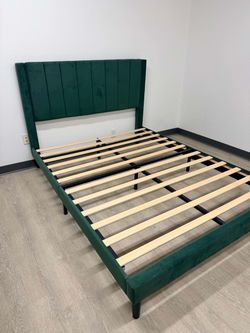 Green upholstered Queen platform bedframe