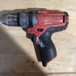 This is a Milwaukee M12 FUEL Hammer Drill. The tool shown in the image is a compact, cordless hammer drill that is part of the Milwaukee M12 battery s