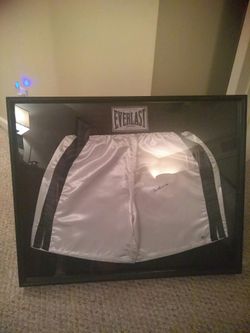 Authentic hand signed Muhammad Ali everlast boxing trunks in display case has certified numbered hulagram