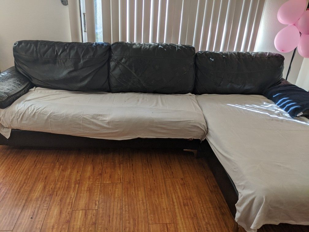 Black leather sectional sofa for sale