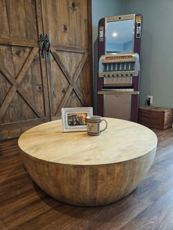 Round sculptural Wooden table