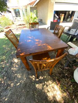 solid Vood table and four chairs $85